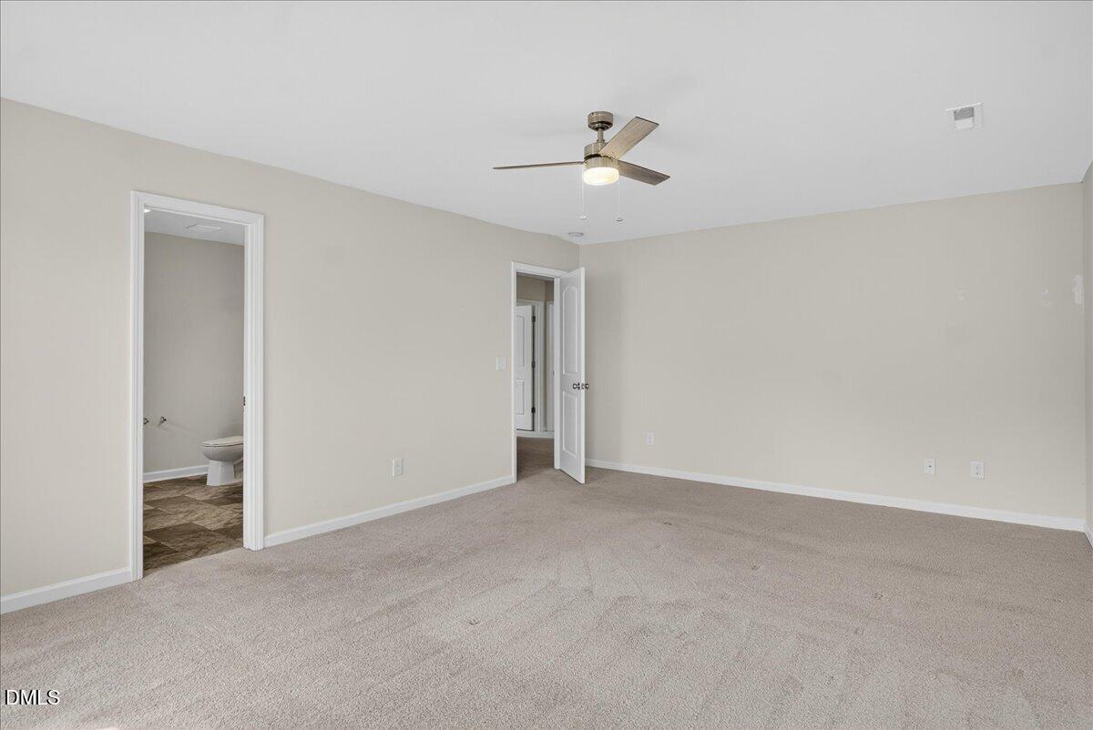 399 West Waycliff Road Henderson, NC 27537 - Photo 25 of 69 a view of an empty room and chandelier fan