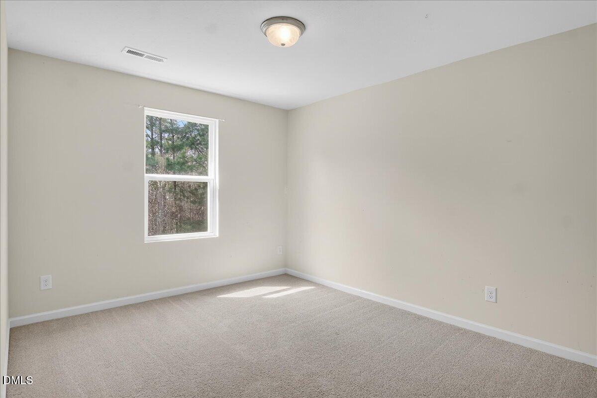 399 West Waycliff Road Henderson, NC 27537 - Photo 35 of 69 an empty room with a window