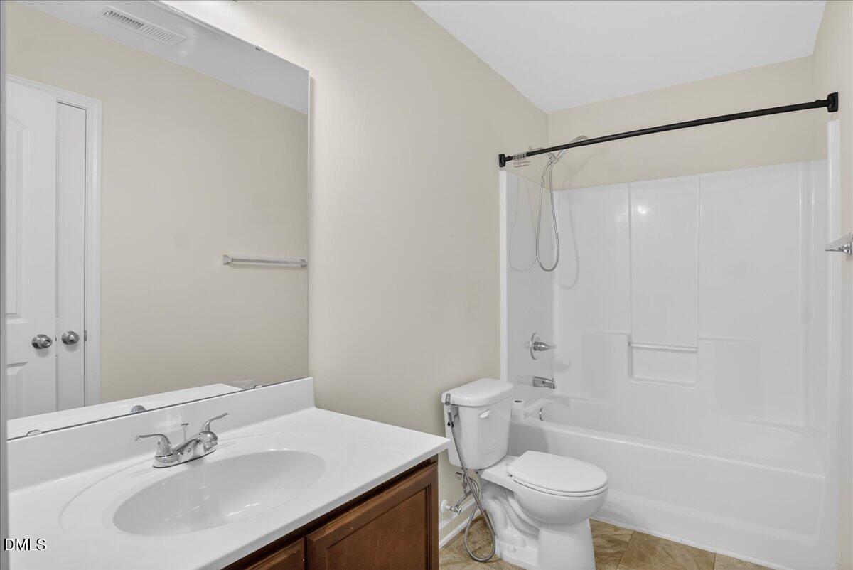 399 West Waycliff Road Henderson, NC 27537 - Photo 46 of 69 a bathroom with a sink toilet and shower