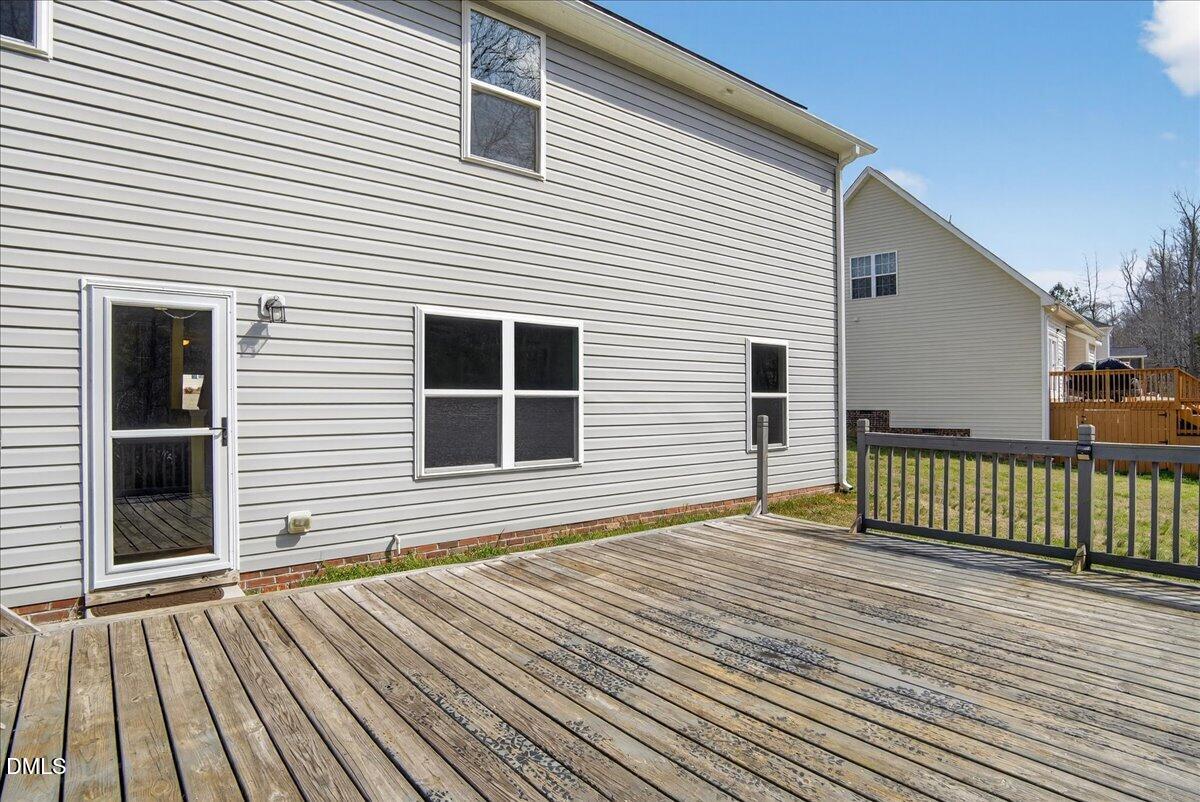 399 West Waycliff Road Henderson, NC 27537 - Photo 49 of 69 a view of a house with a roof deck