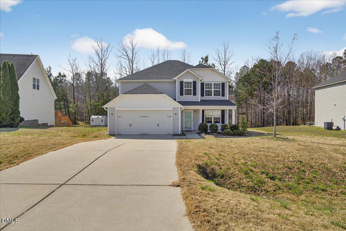 399 West Waycliff Road Henderson, NC 27537 - Photo 55 of 69 a front view of a house with a yard