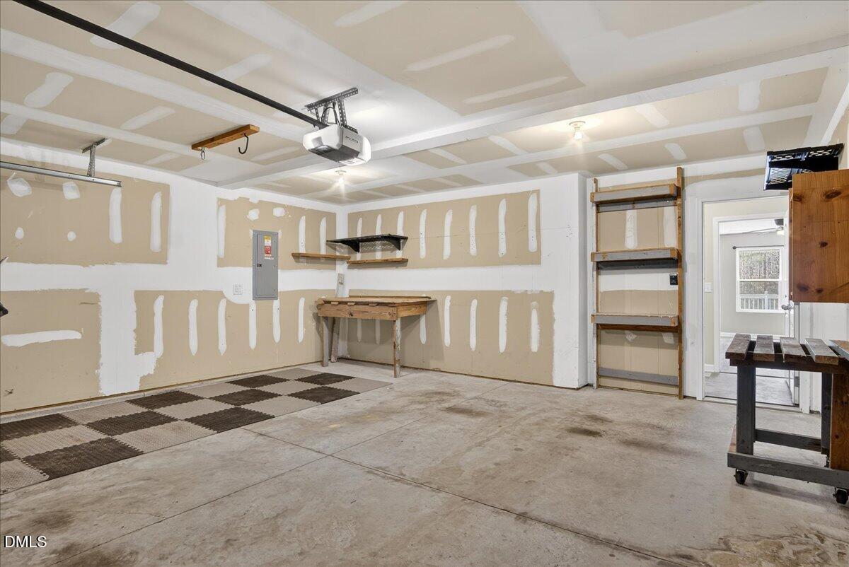 399 West Waycliff Road Henderson, NC 27537 - Photo 58 of 69 a view of a livingroom with wooden furniture and windows