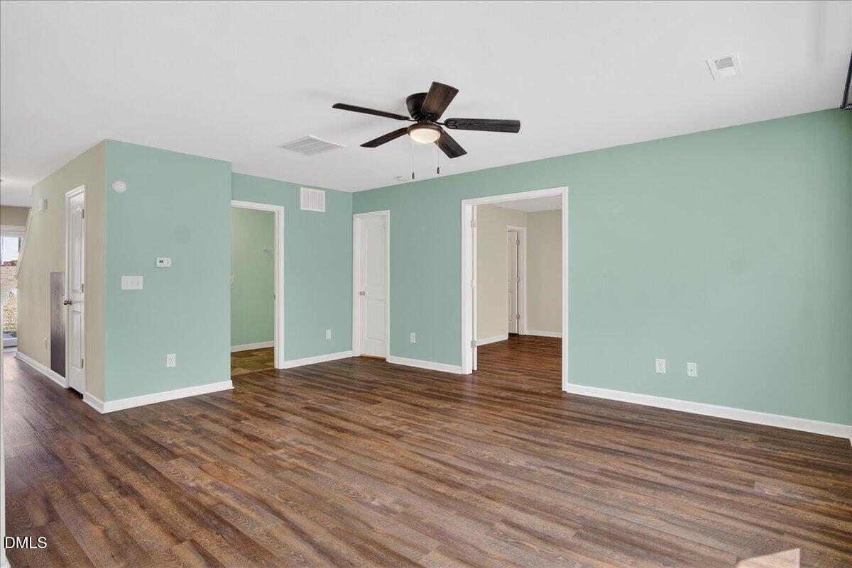 399 West Waycliff Road Henderson, NC 27537 - Photo 4 of 69 wooden floor in an empty room with a window