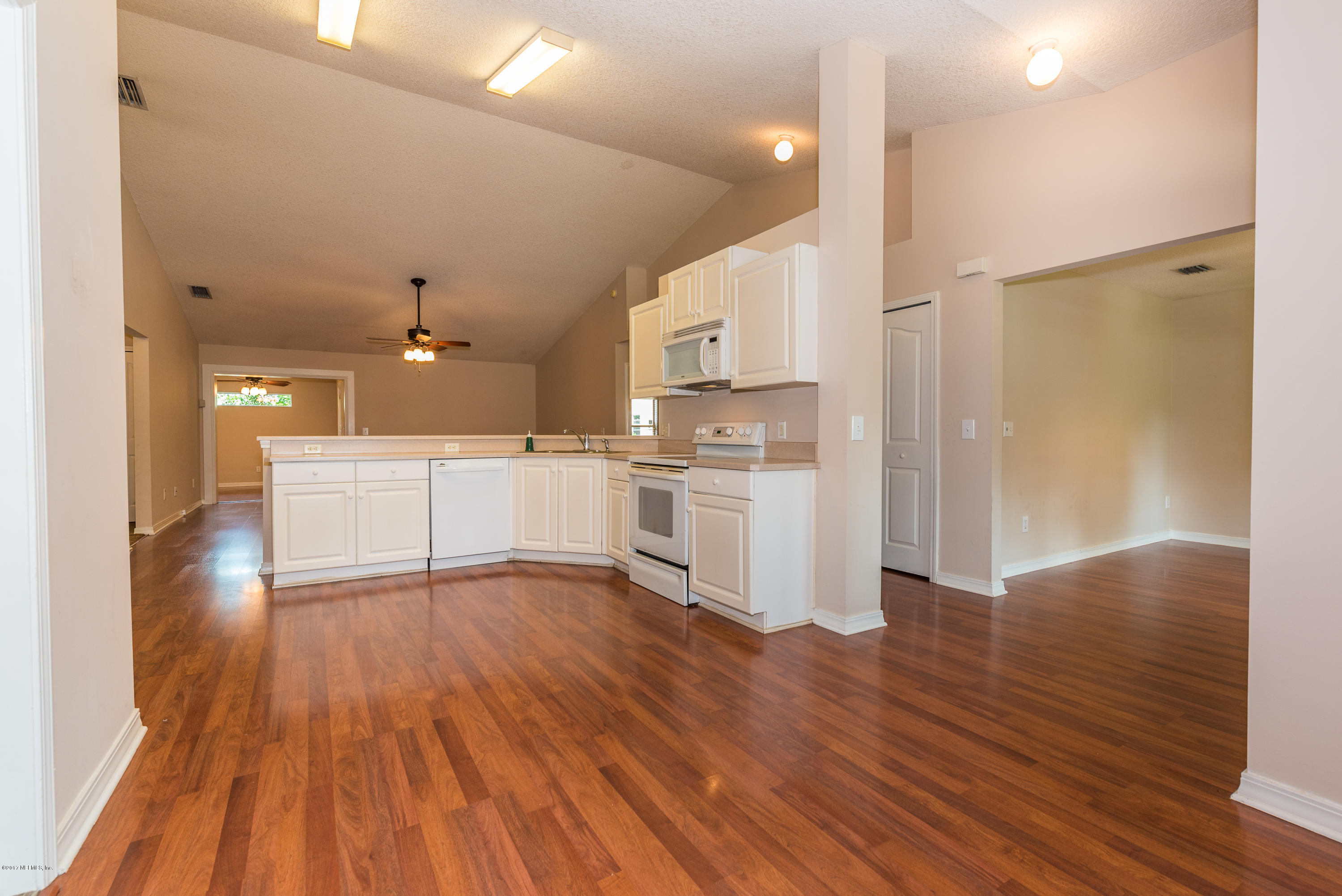 444 Orchis Road St. Augustine, FL 32086 - Photo 15 of 56 a view of kitchen with wooden floor