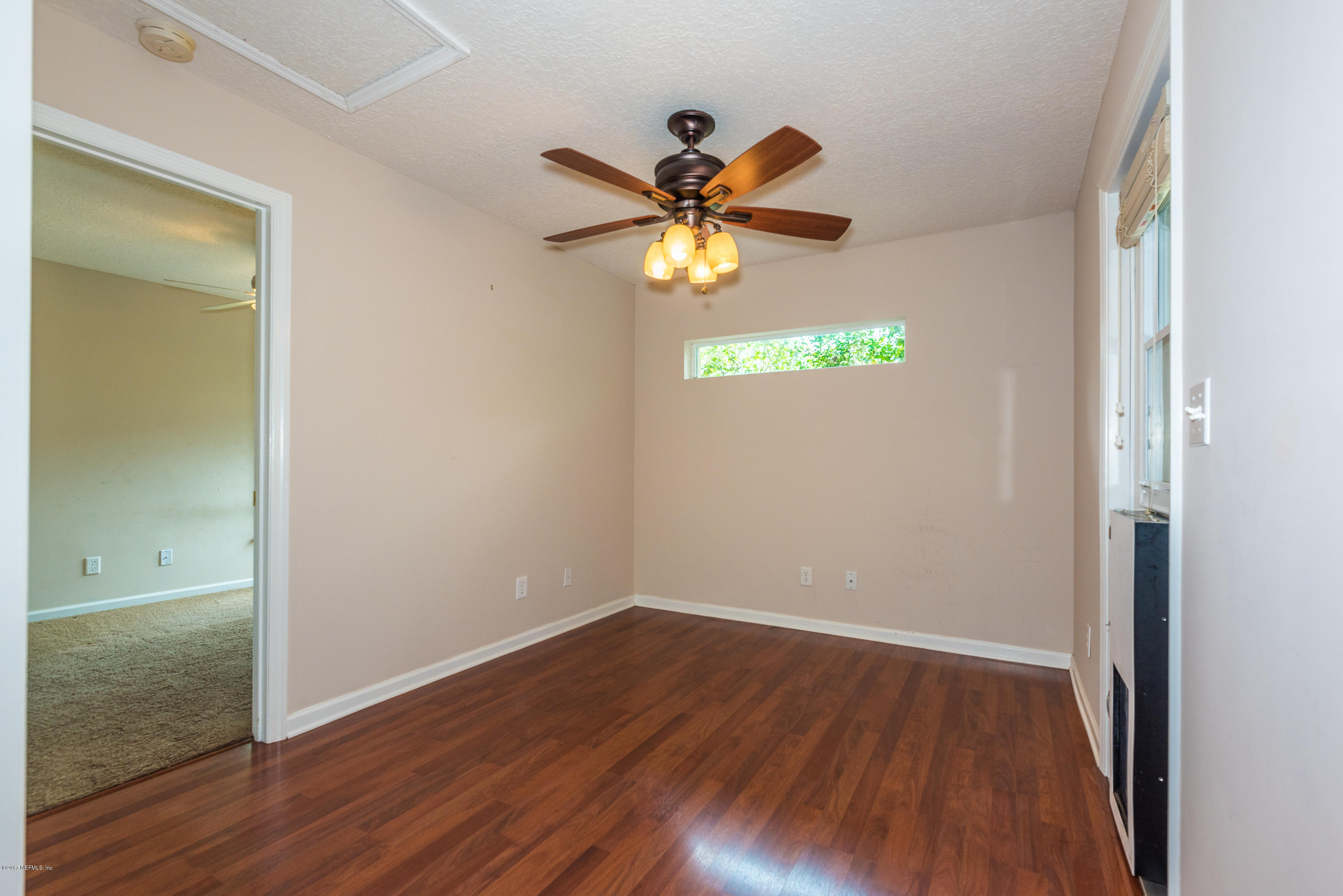 444 Orchis Road St. Augustine, FL 32086 - Photo 20 of 56 a view of an entryway with wooden floor