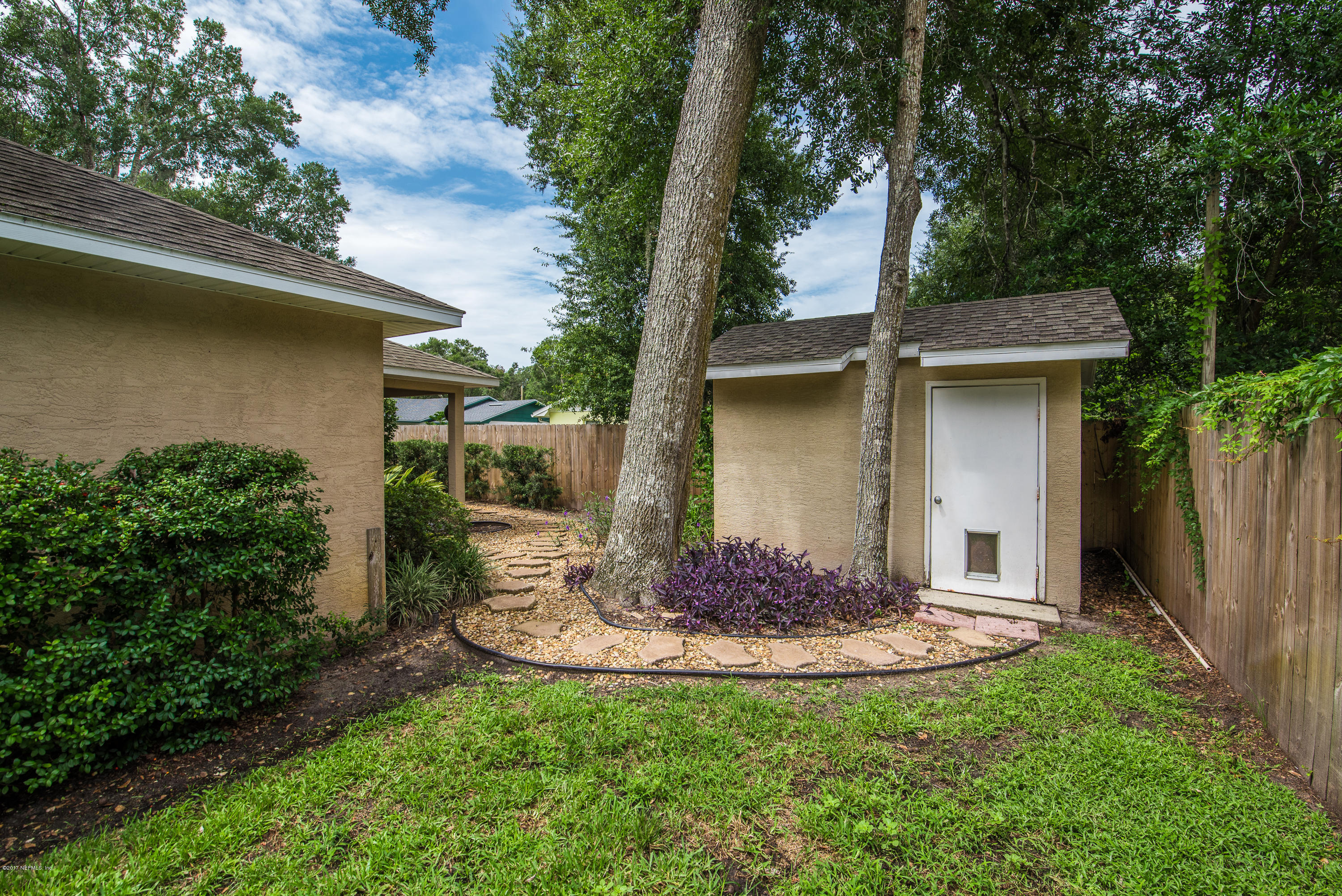 444 Orchis Road St. Augustine, FL 32086 - Photo 35 of 56 a view of a back yard of the house