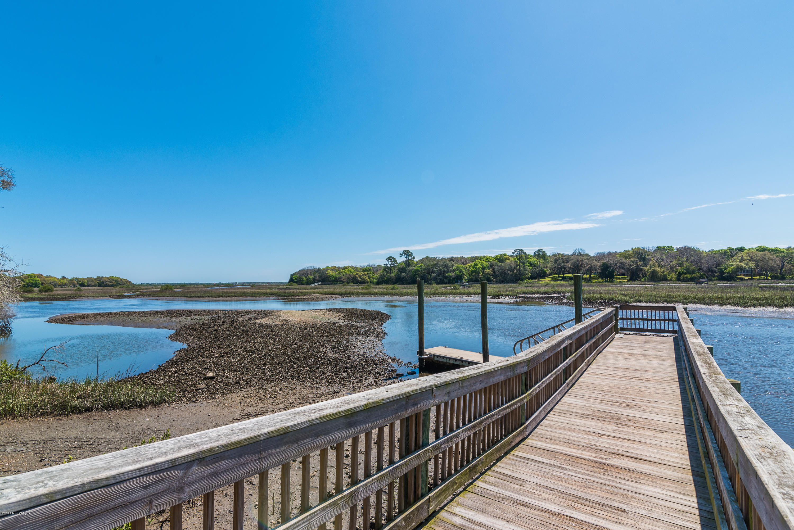 444 Orchis Road St. Augustine, FL 32086 - Photo 55 of 56 a view of a lake with a terrace