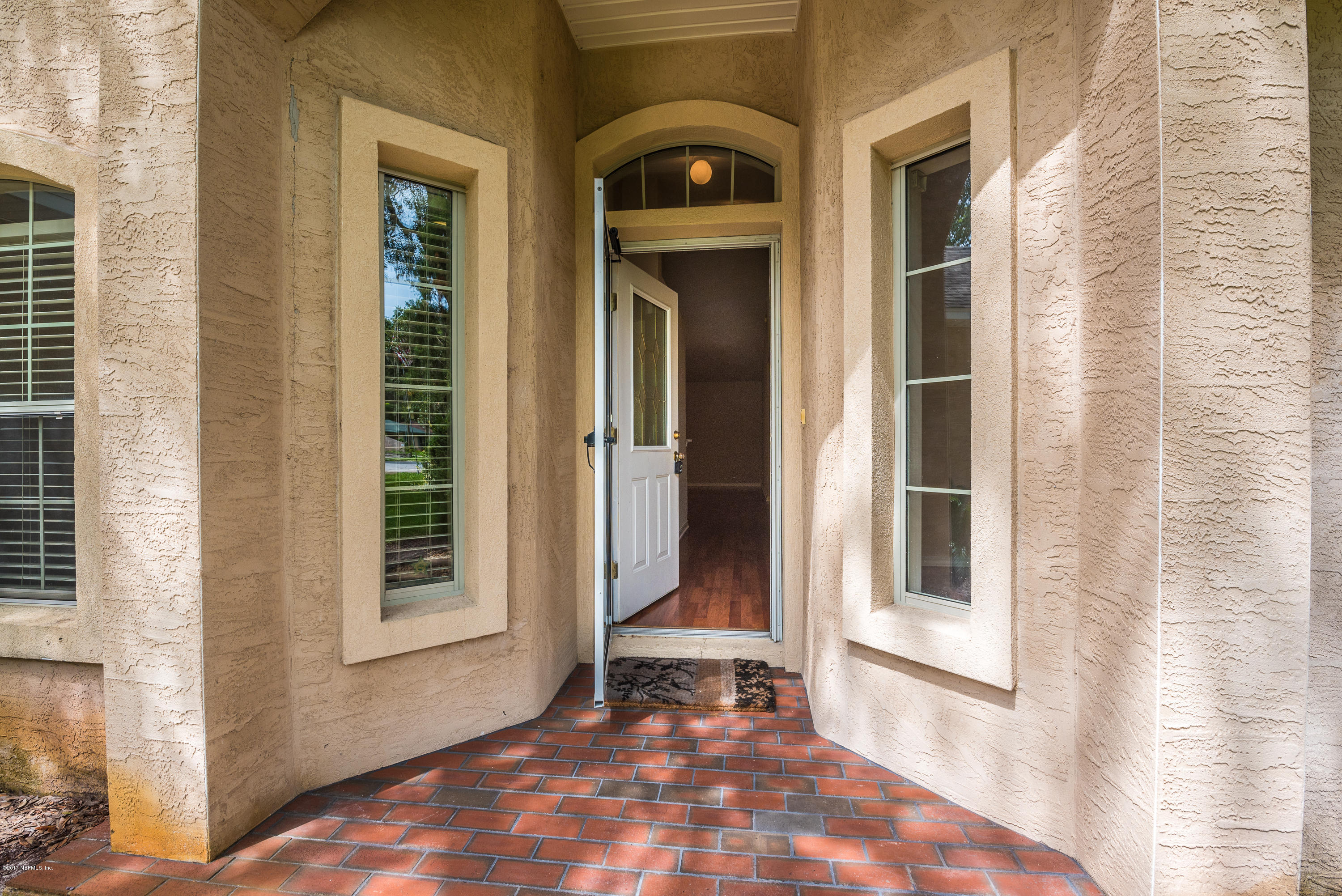 444 Orchis Road St. Augustine, FL 32086 - Photo 7 of 56 a view of front door of house