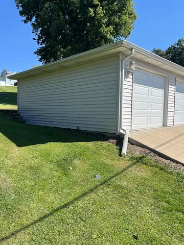 a view of a backyard with a garden