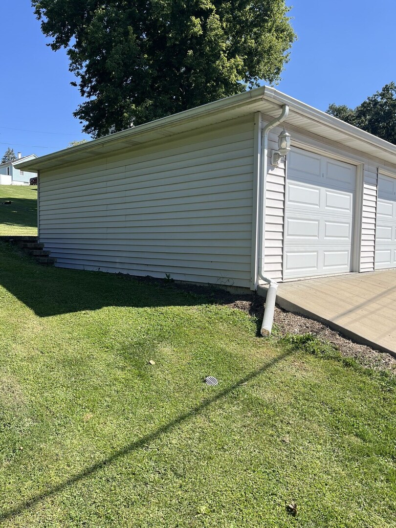 1310 Belleview Avenue Joliet, IL 60436 - Photo 3 of 9 a view of a backyard with a garden