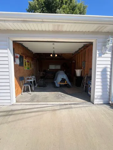 a view of a livingroom with furniture and front door