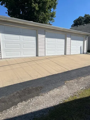 a view of outdoor space and a garage