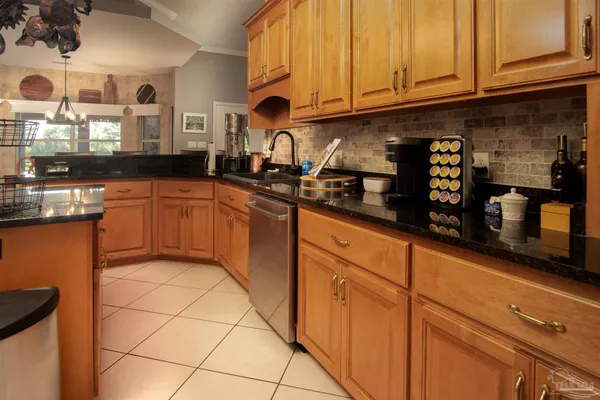 a close view of a sink and stove