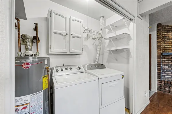 a utility room with dryer and washer
