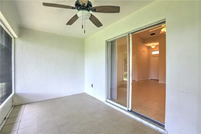 a view of a porch and garden