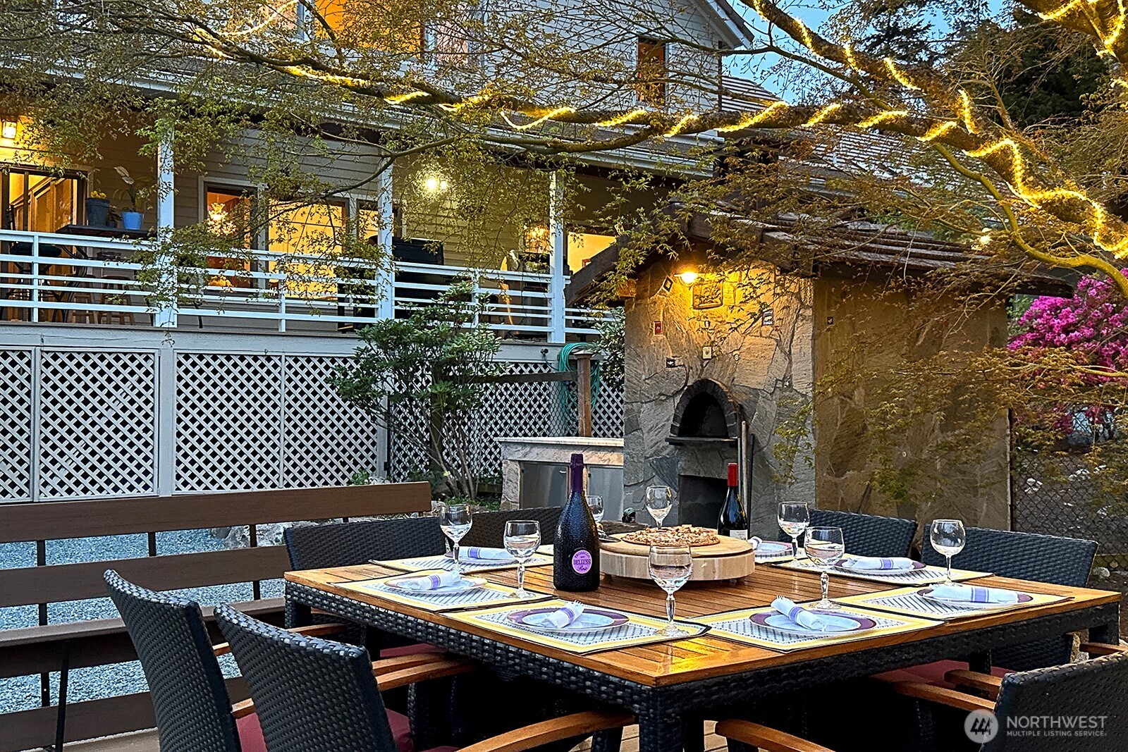 5741 Crow Haven Road Langley, WA 98260 - Photo 6 of 40 a view of a tables and chairs in patio