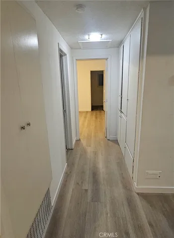 a bathroom with a double vanity sink a mirror and a