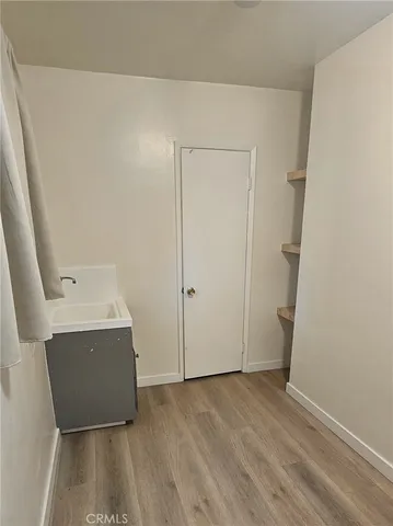 a bathroom with a sink and mirror