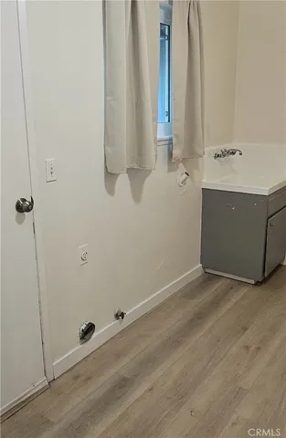 a living room with a fireplace and a table