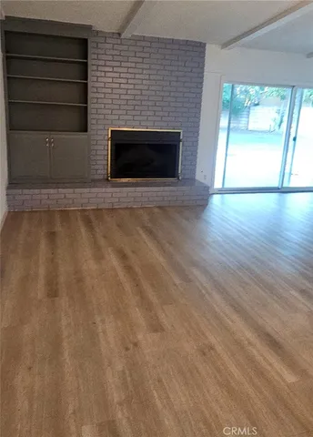 a view of a park with a tree