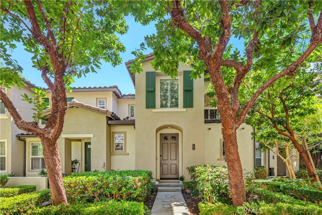 48 Dovetail Irvine, CA 92603 - Photo 1 of 1 front view of a house with a tree