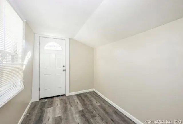 a view of an empty room and window