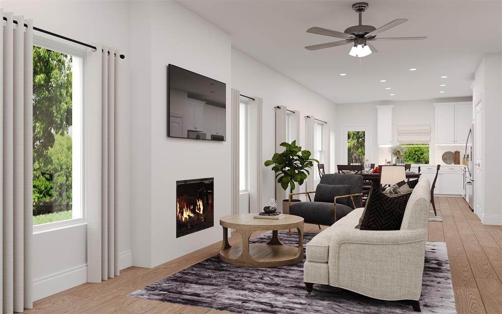 8704 Saratoga Street Pilot Point, TX 76258 - Photo 2 of 7 a living room with furniture and a fireplace