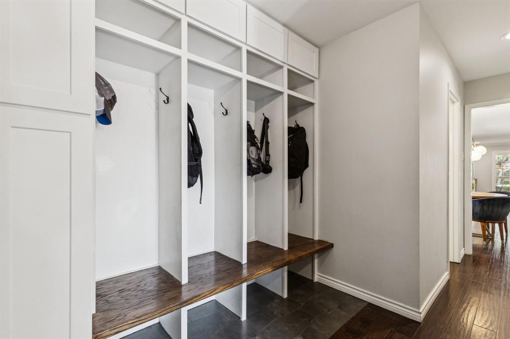 6222 East University Boulevard Dallas, TX 75214 - Photo 20 of 25 a view of walk in closet with clothes and shoes