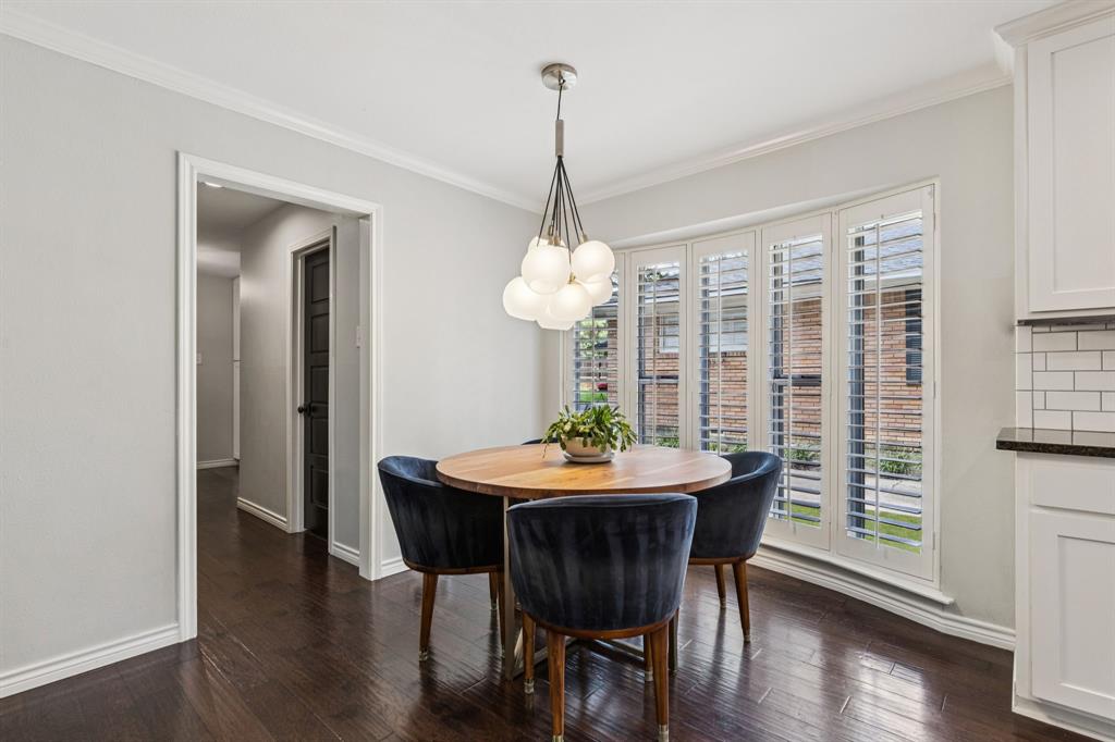 6222 East University Boulevard Dallas, TX 75214 - Photo 10 of 25 a dining room with furniture window and wooden floor