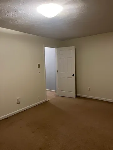 an empty room with a gallery