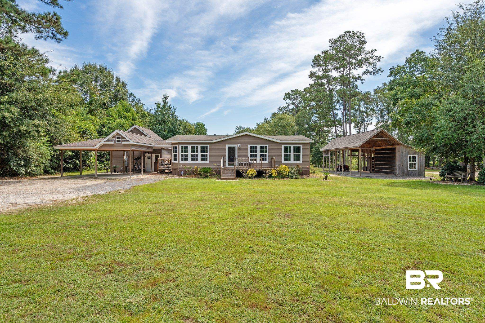 4510 Brannon Road Wilmer, AL 36587 - Photo 1 of 36 Single story home featuring a carport and a front lawn