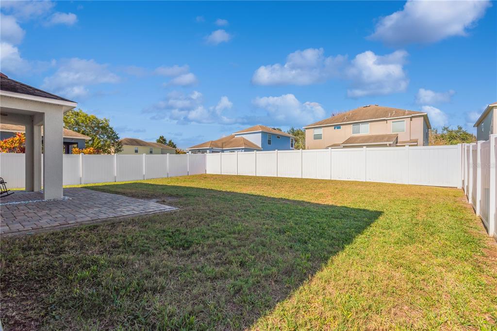 18345 Fish Loop Land O Lakes, FL 34638 - Photo 32 of 36 a view of an house with backyard