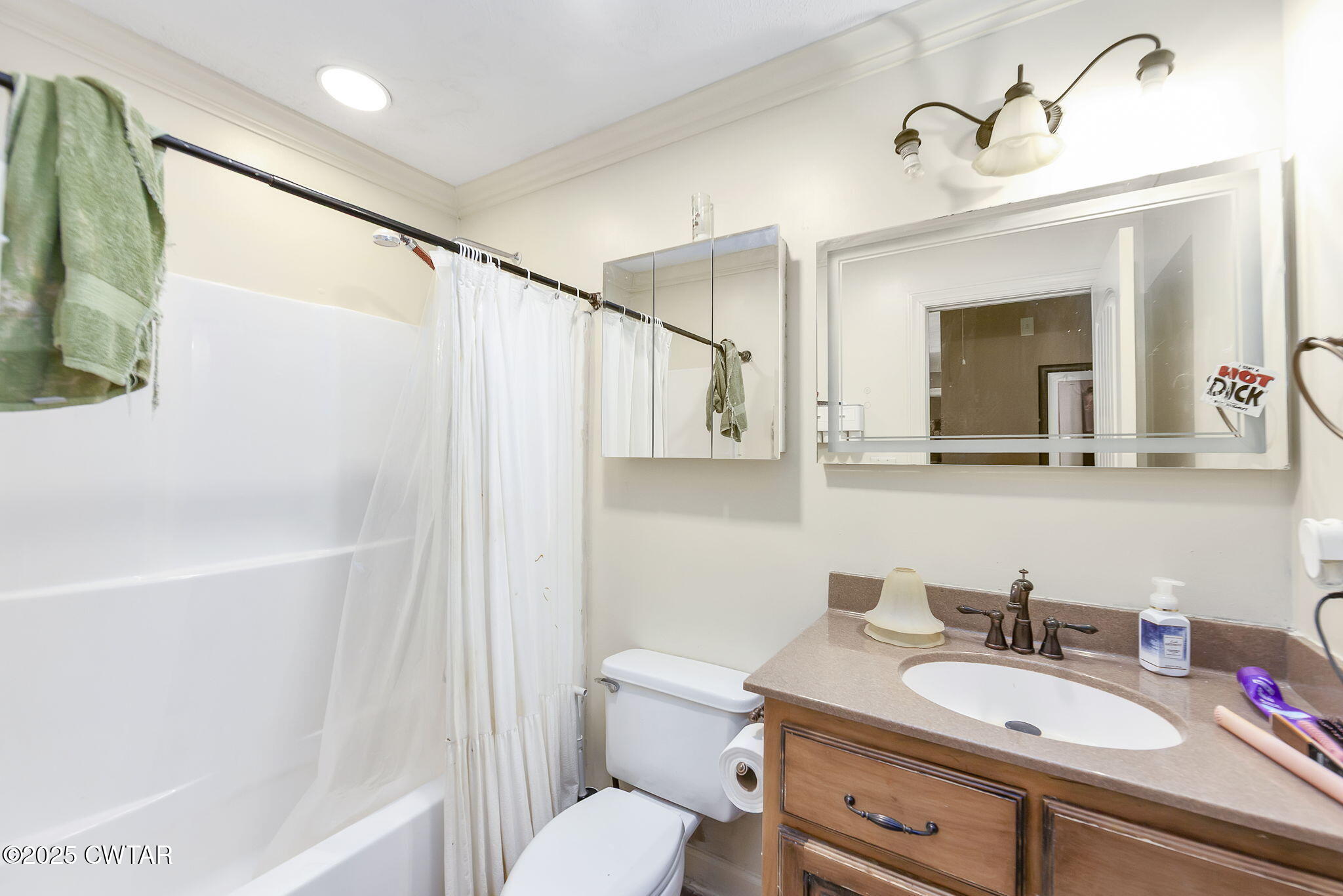226 Fawn Ridge Lane Medina, TN 38355 - Photo 19 of 22 a bathroom with a sink a toilet and shower