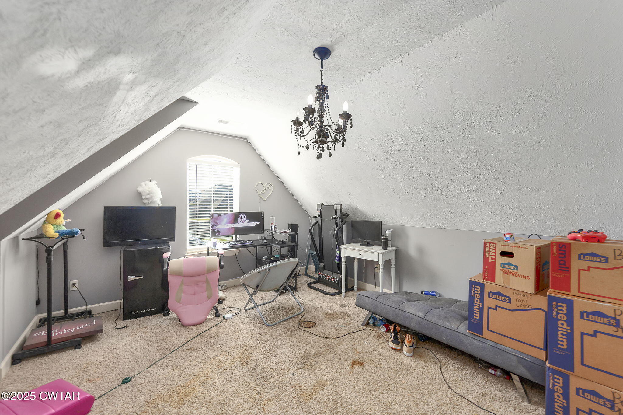 226 Fawn Ridge Lane Medina, TN 38355 - Photo 20 of 22 a living room with furniture and a chandelier