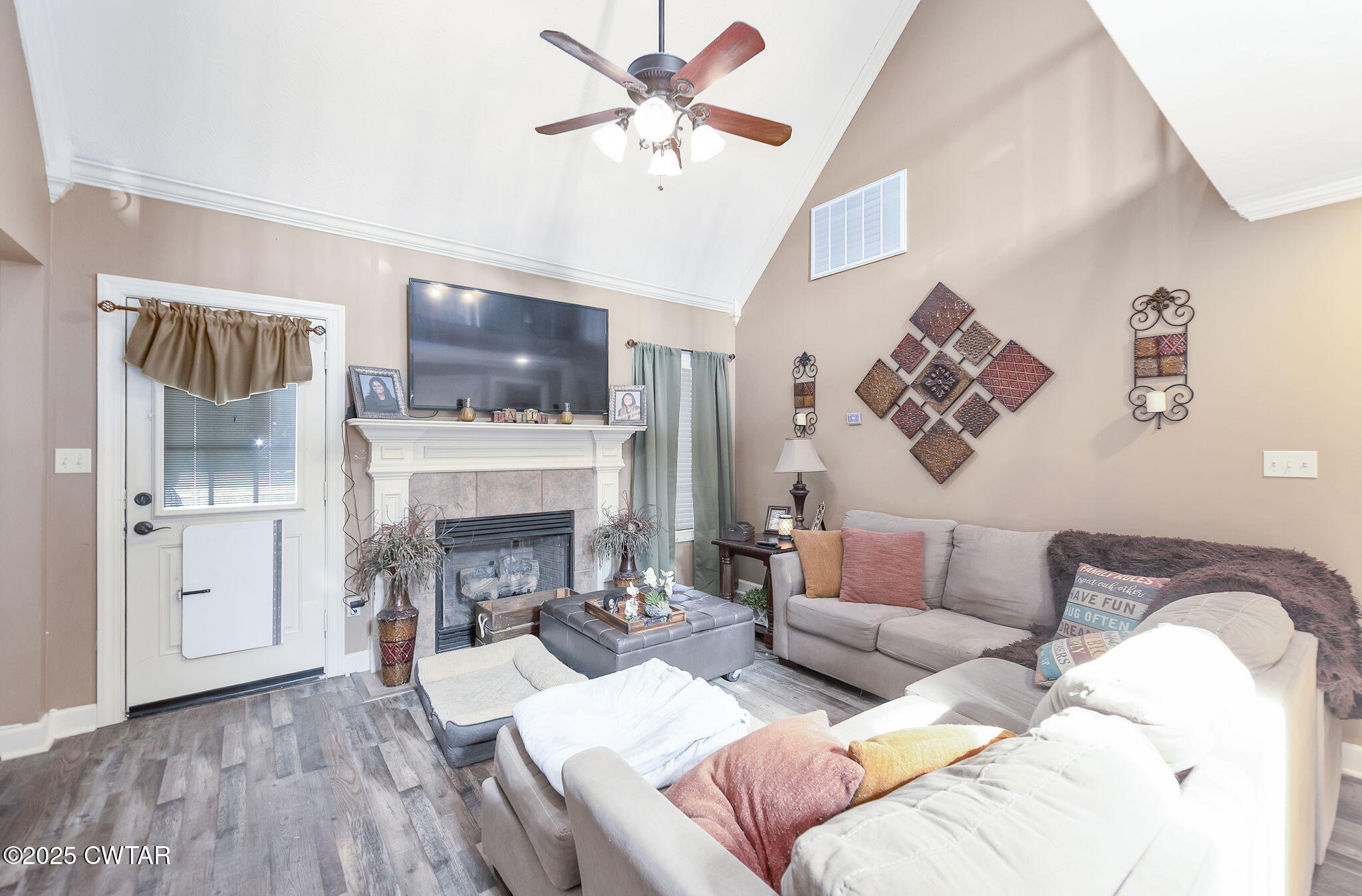 226 Fawn Ridge Lane Medina, TN 38355 - Photo 10 of 22 a living room with furniture and a fireplace