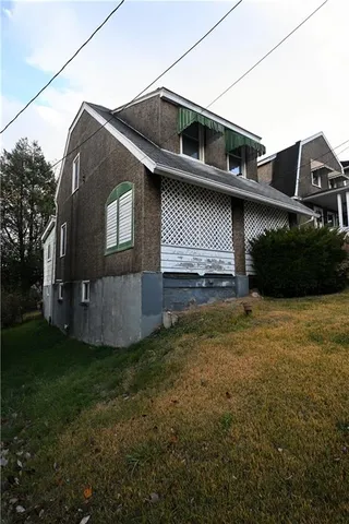 a house view with a garden space