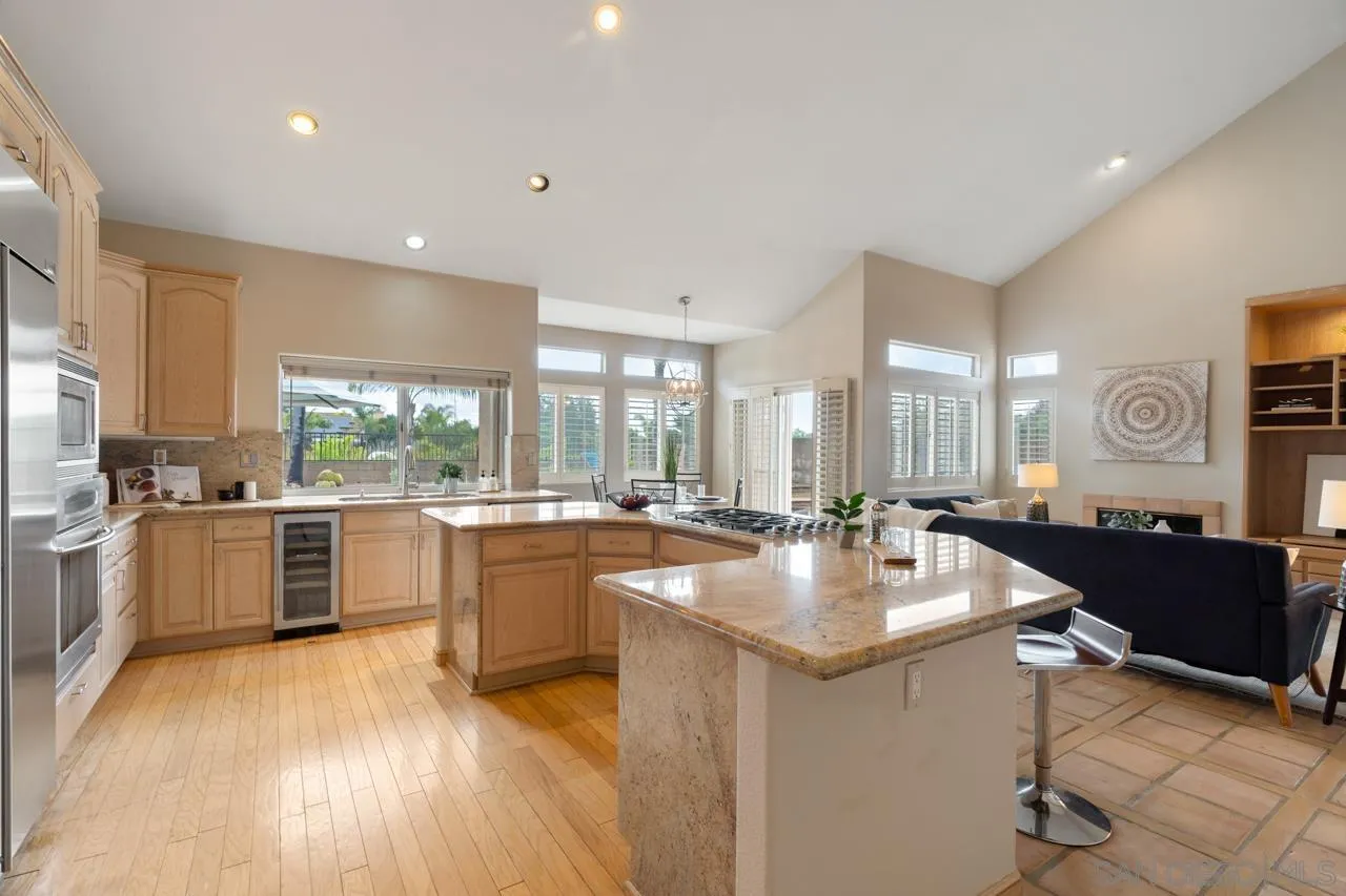 12245 Malabar Drive Poway, CA 92064 - Photo 15 of 43 a large kitchen with lots of counter space a sink and appliances