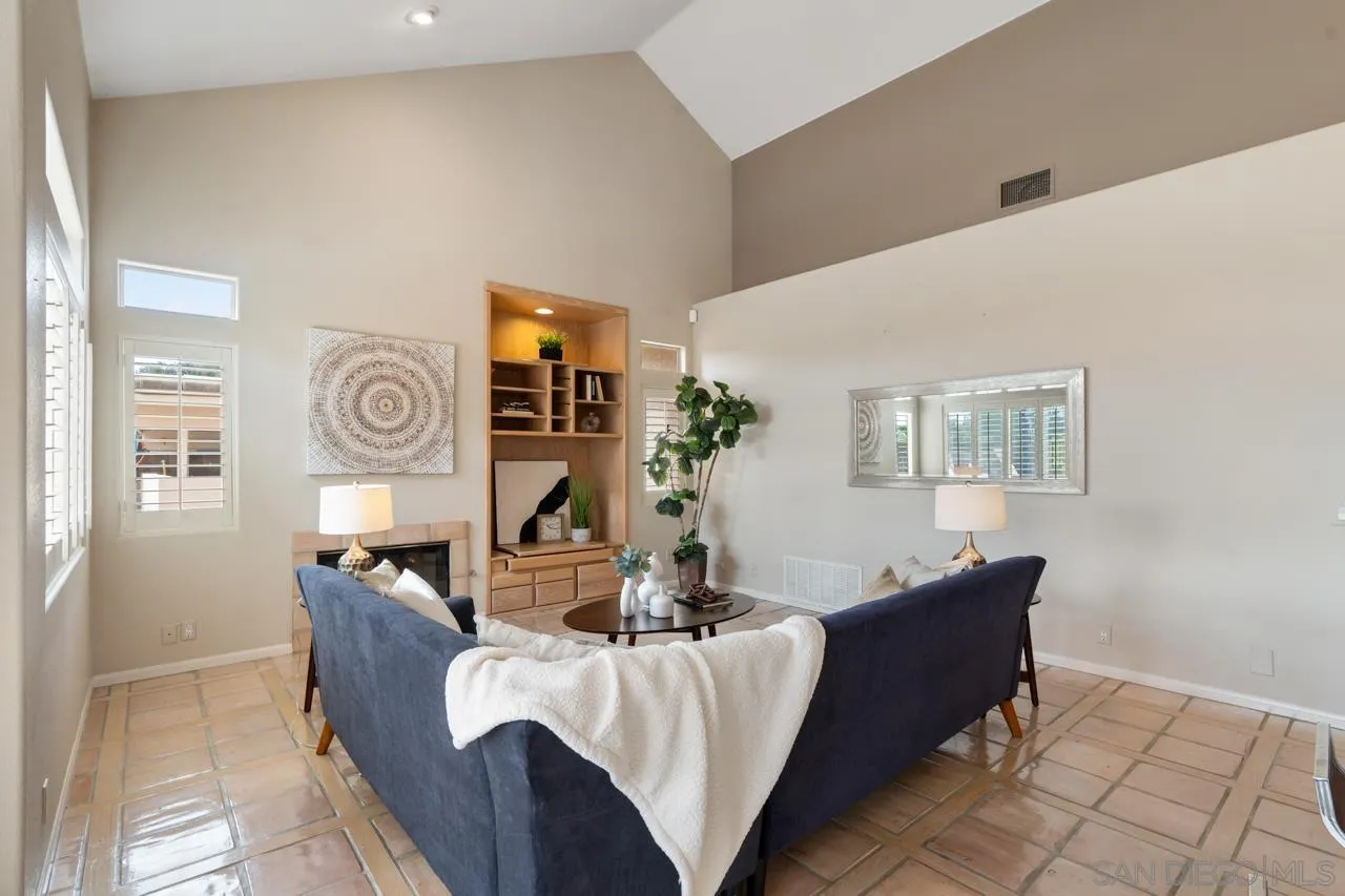 12245 Malabar Drive Poway, CA 92064 - Photo 20 of 43 a living room with furniture and a window