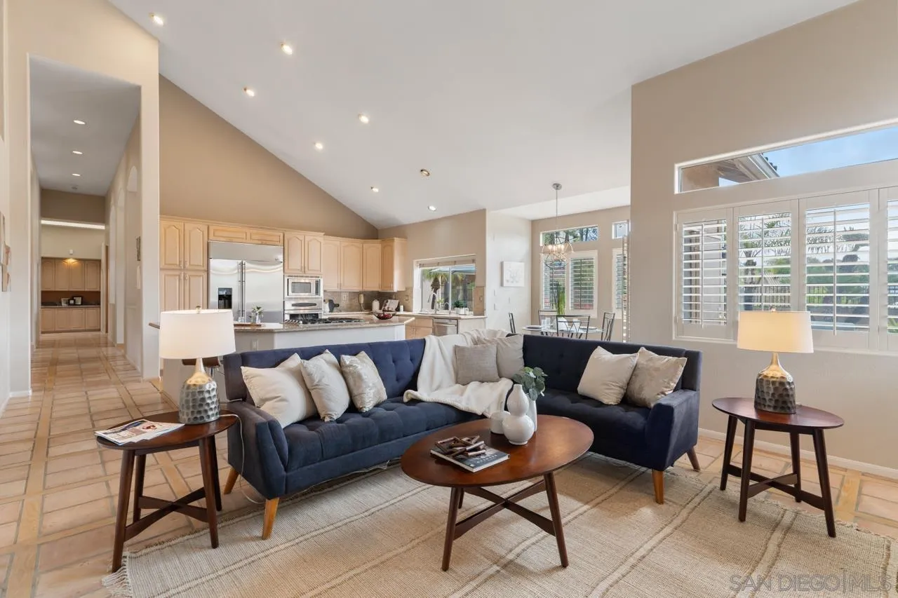 12245 Malabar Drive Poway, CA 92064 - Photo 22 of 43 a living room with furniture and a large window