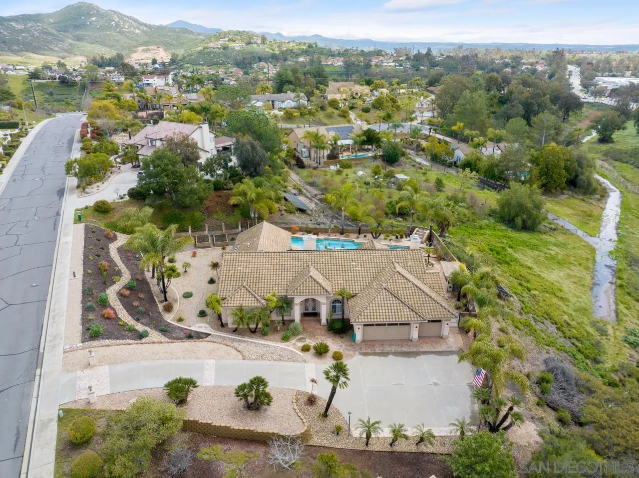 12245 Malabar Drive Poway, CA 92064 - Photo 42 of 43 an aerial view of a house with a yard