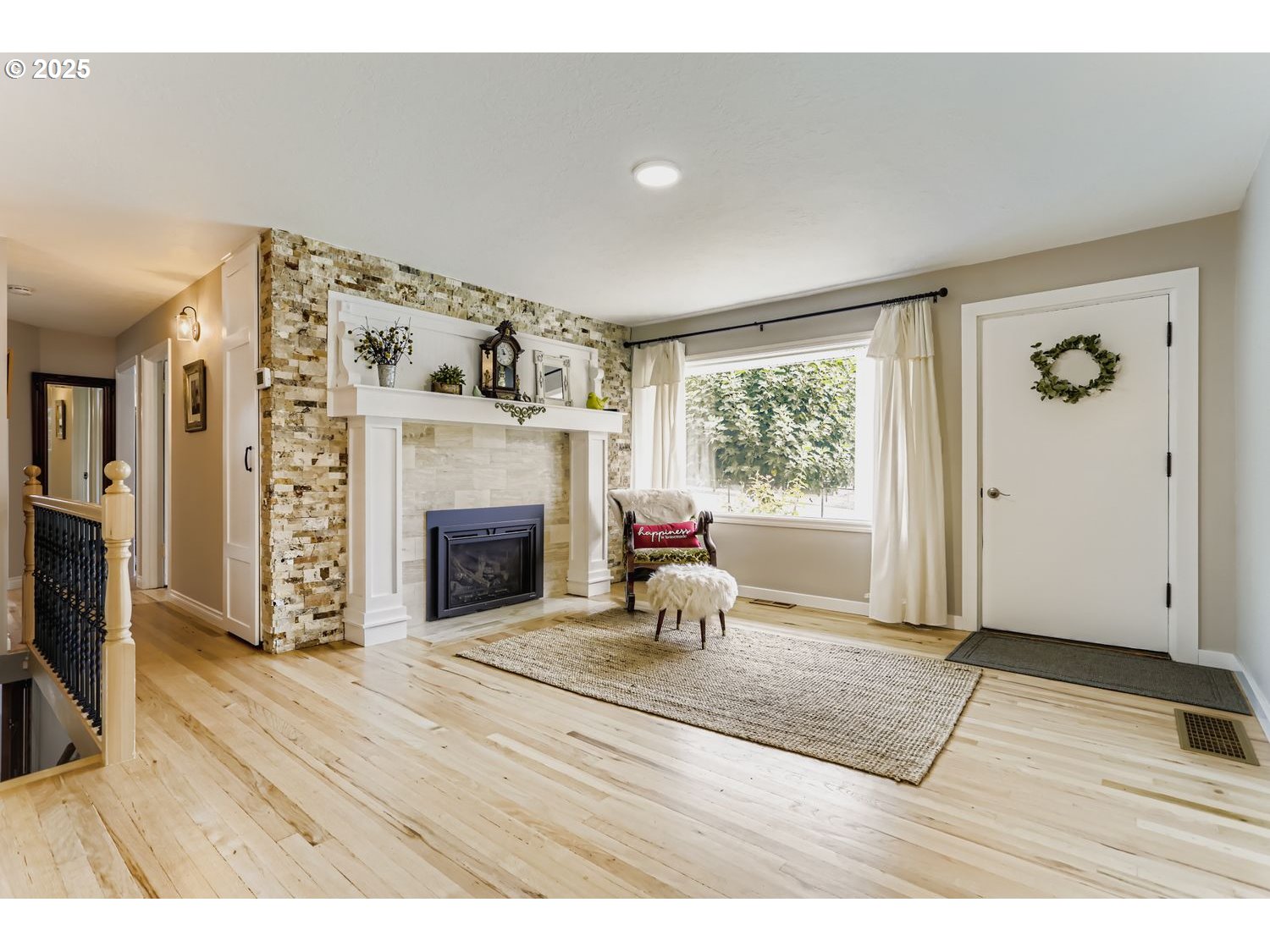 4711 Southeast Roethe Road Milwaukie, OR 97267 - Photo 12 of 30 a living room with furniture and a fireplace