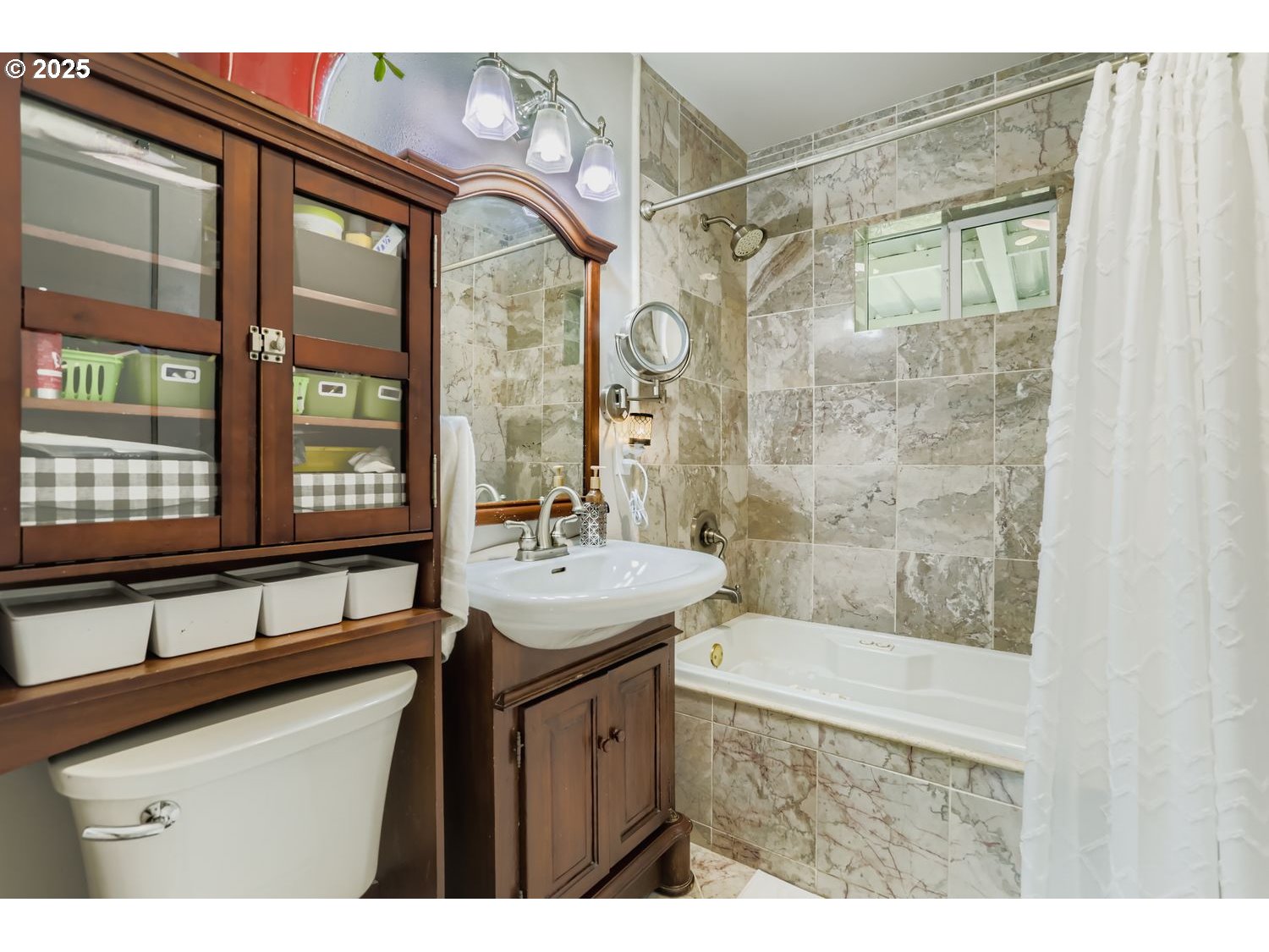 4711 Southeast Roethe Road Milwaukie, OR 97267 - Photo 16 of 30 a bathroom with a sink and a mirror