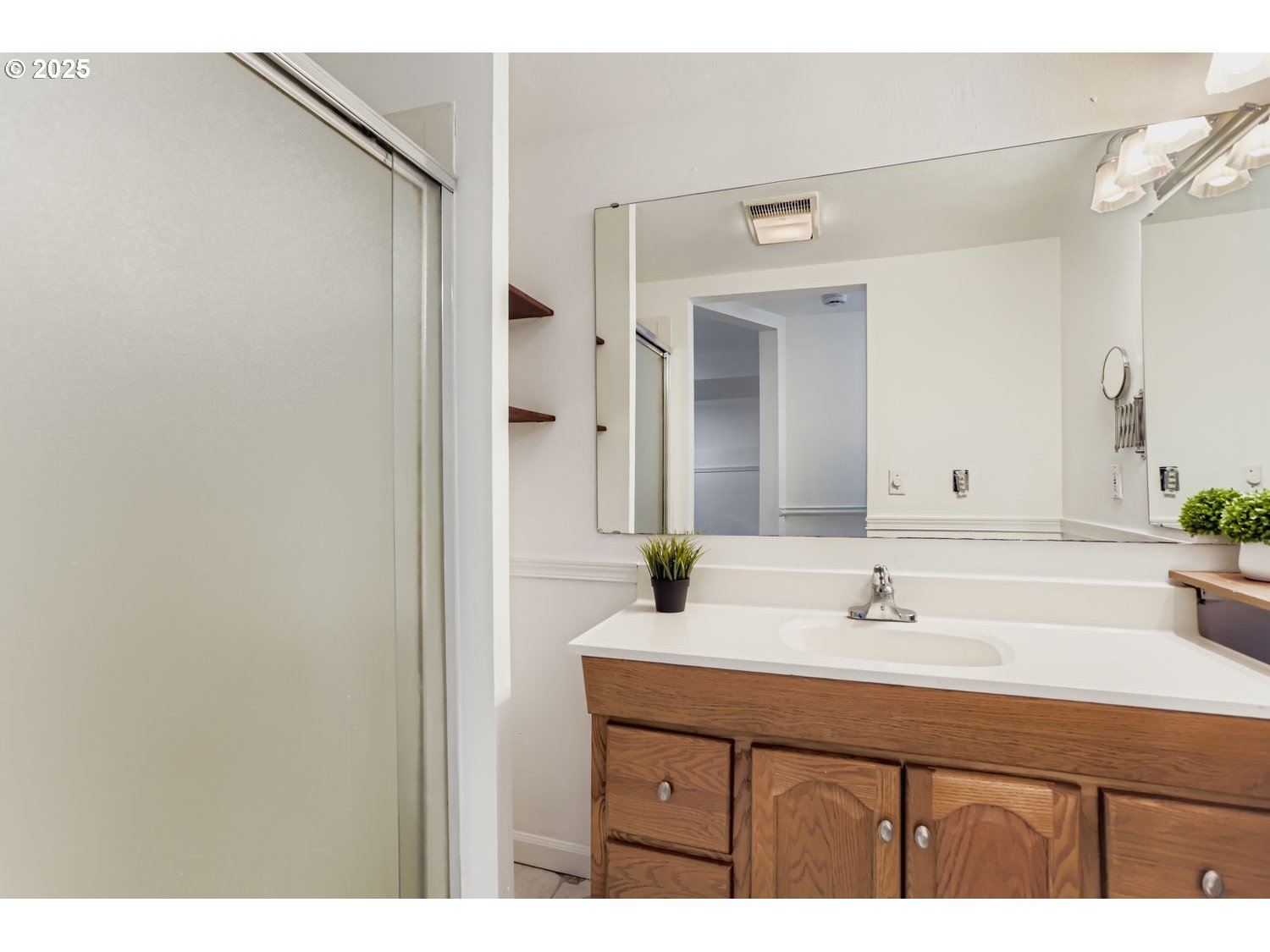 4711 Southeast Roethe Road Milwaukie, OR 97267 - Photo 24 of 30 a bathroom with a sink and a mirror