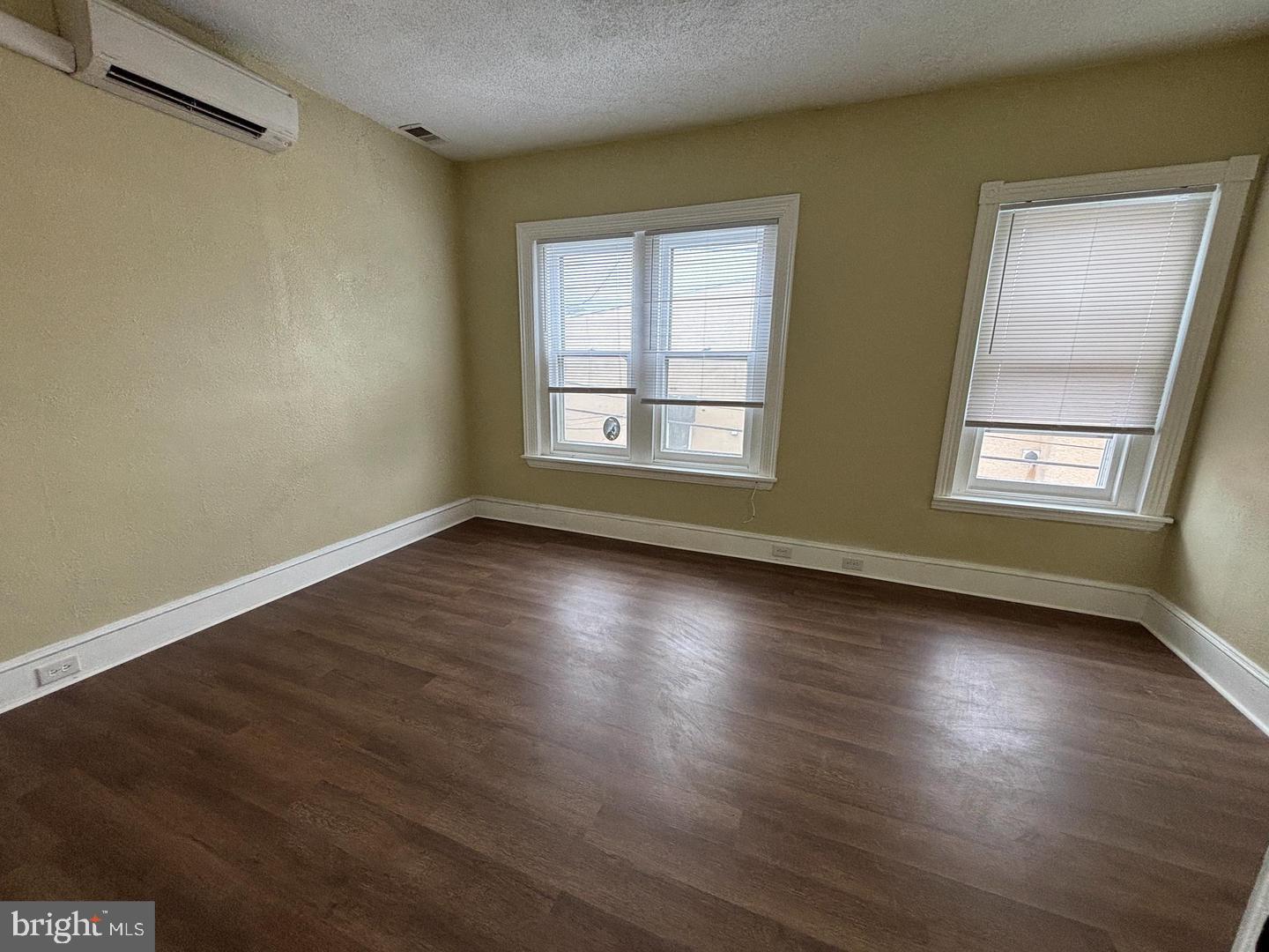 130 East 4th Street, Unit 2 Pottstown, PA 19464 - Photo 12 of 16 a view of room with window and wooden floor