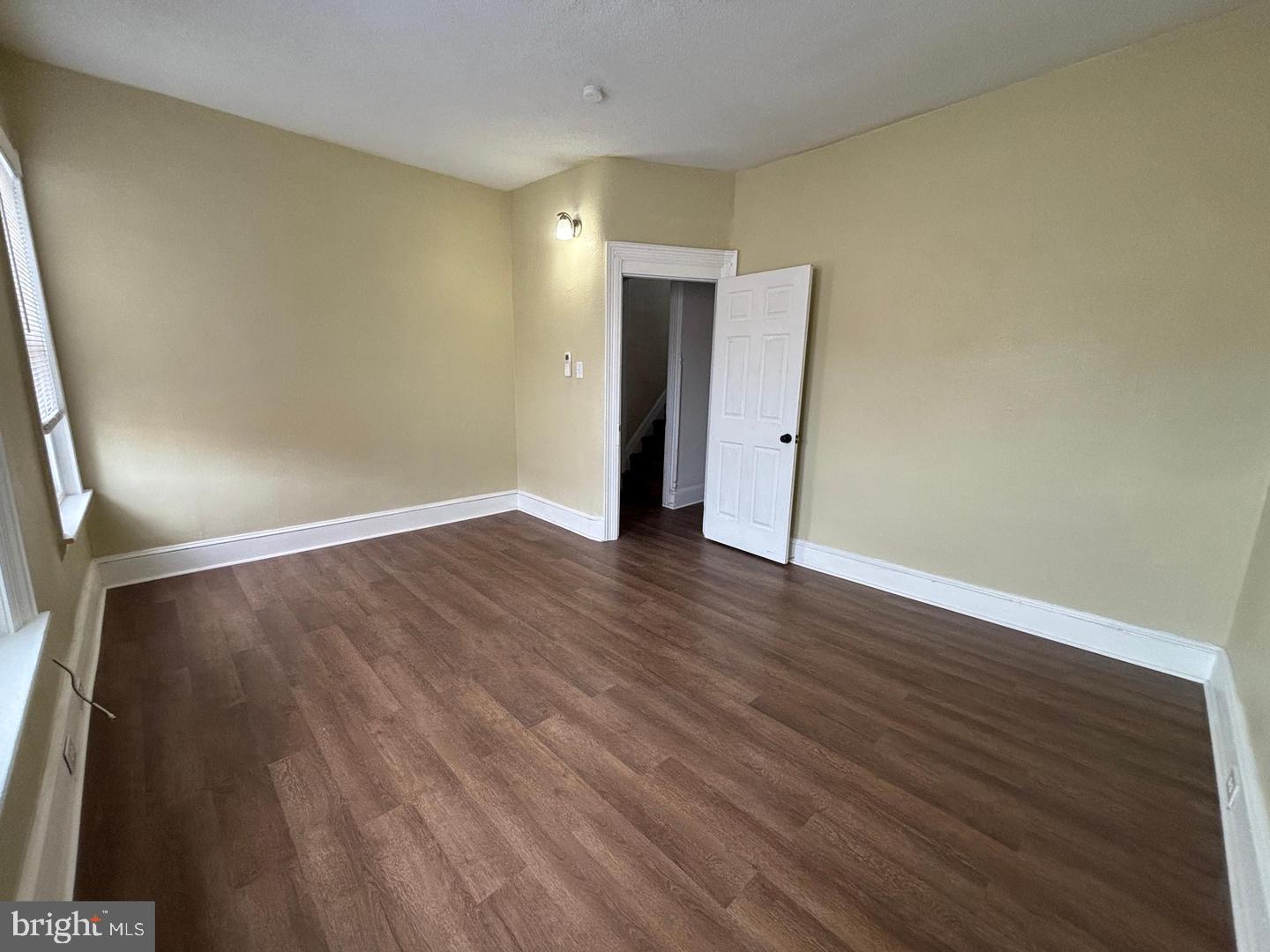 130 East 4th Street, Unit 2 Pottstown, PA 19464 - Photo 13 of 16 a view of an empty room with wooden floor