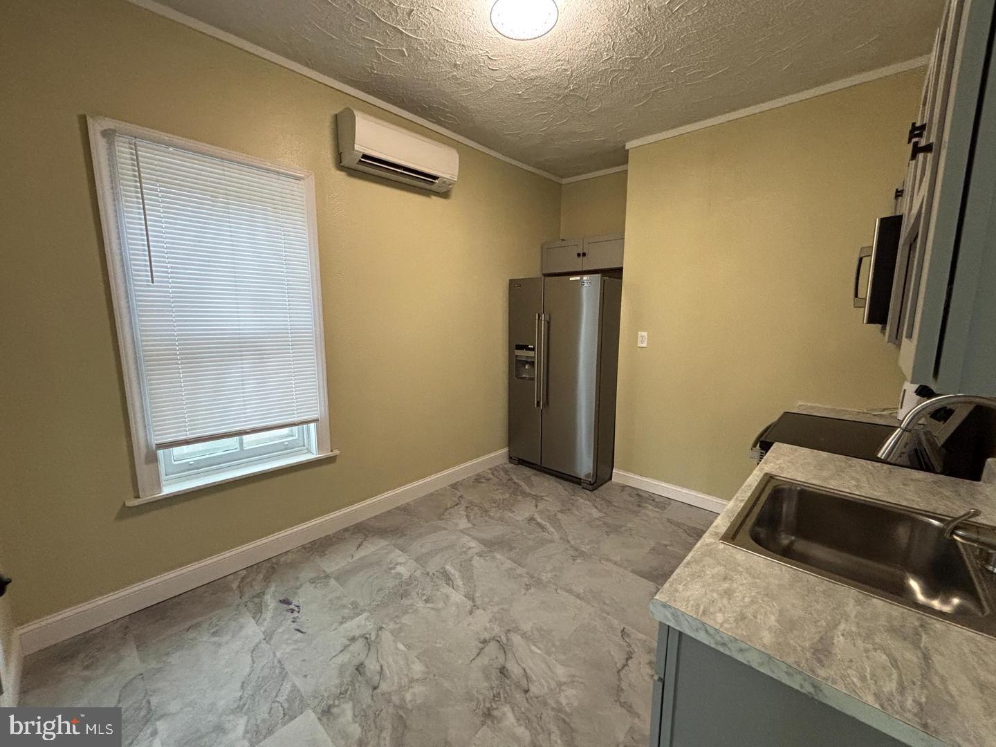 130 East 4th Street, Unit 2 Pottstown, PA 19464 - Photo 3 of 16 a view of a storage & utility room with a sink
