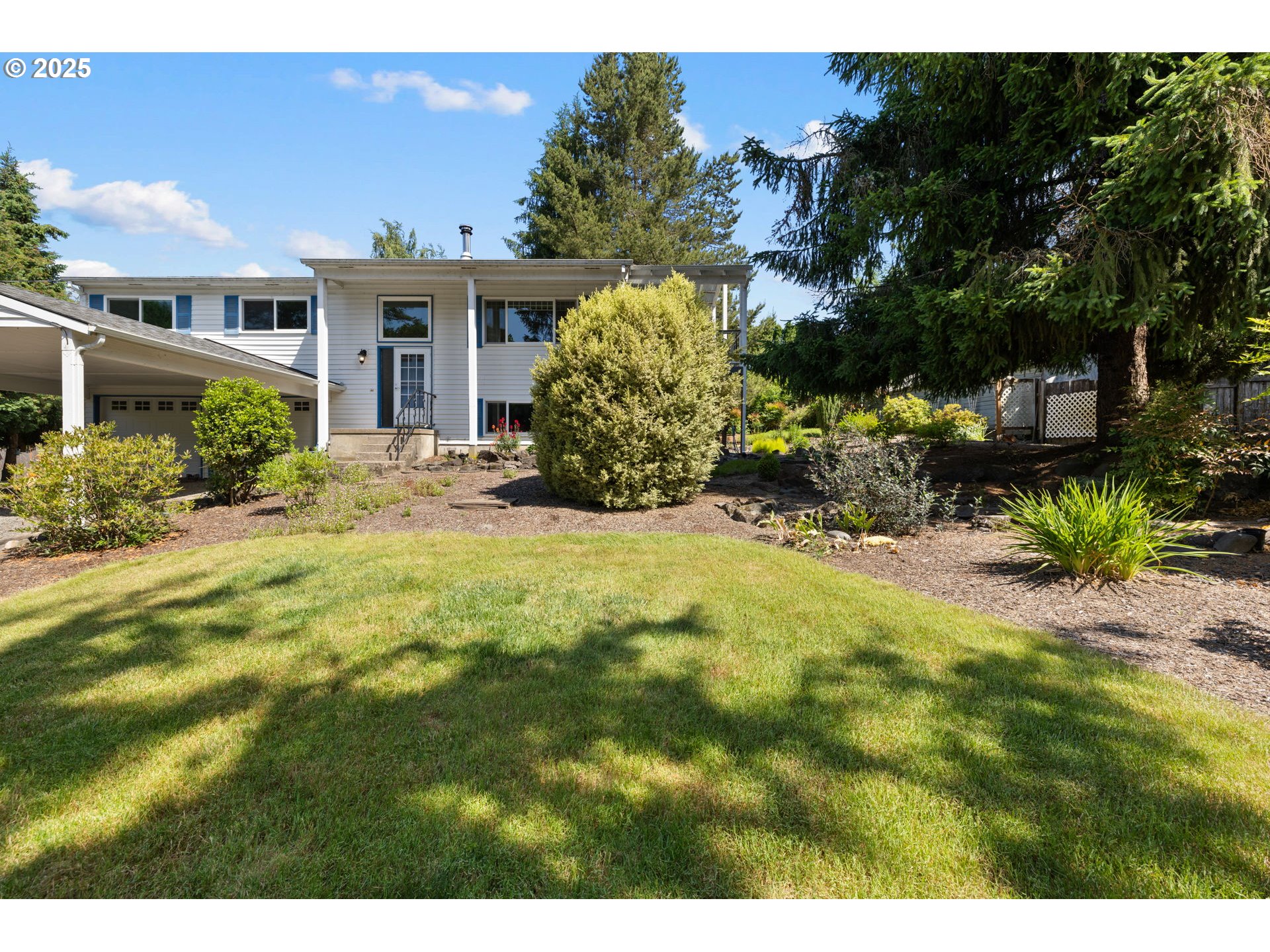 44505 Southwest Knight Road Gaston, OR 97119 - Photo 40 of 46 a view of a house with a yard and sitting area