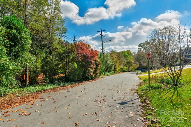 a view of a backyard of the house