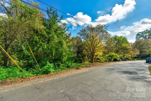 a view of backyard with swimming pool