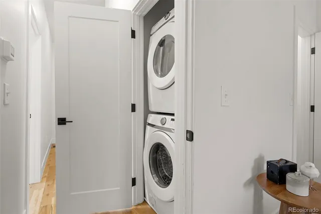 a view of a cars parked on the side of a street